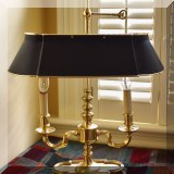 D15. 2-Light brass table lamp with black shade. 